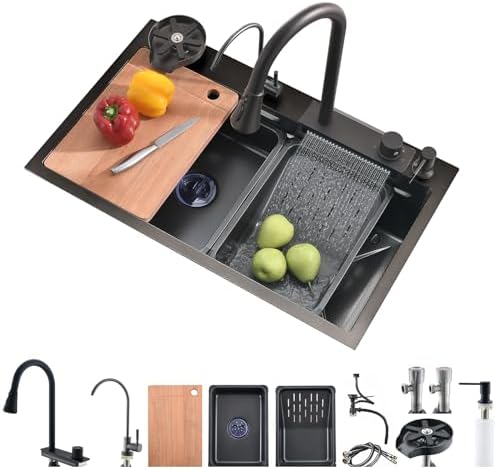 A top-down view of the black Raindance Nano kitchen sink showing the double-step workstation design with a wooden chopping board and colander in place.