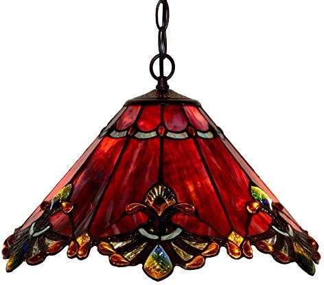 A close-up view of the Bieye L30059 17-inch Baroque style stained glass lampshade showing intricate red and amber glass patterns.