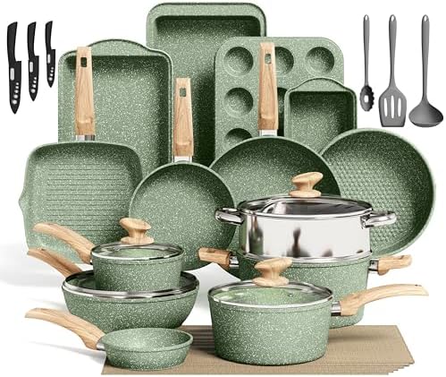 A complete 30-piece Kitchen Academy cookware and bakeware set in green granite finish displayed on a kitchen counter.